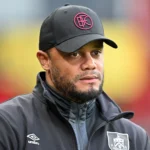 vincent-kompany-walk-past-statue-803593110